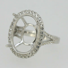 Sterling silver semi mount ring setting with white topaz halo and split shank for oval stone, 20x15mm.
