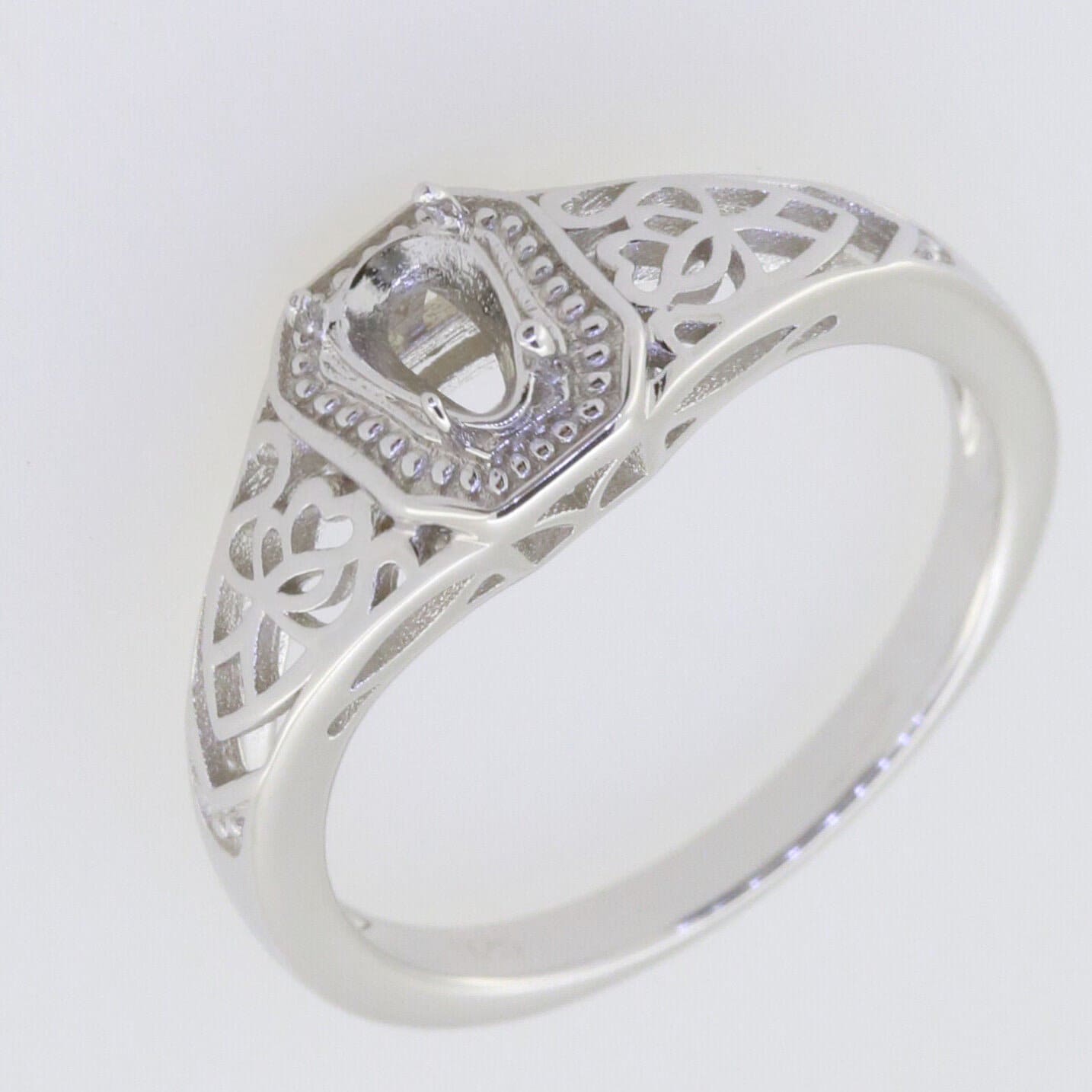 Custom Sterling Silver semi mount ring setting with vintage design for 6x4mm pear gemstone, featuring intricate details.