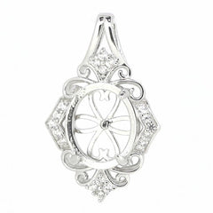 Vintage sterling silver semi mount pendant setting for 12x10mm cabochon with white topaz accents.