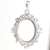 Sterling silver semi-mount pendant setting with white topaz, designed for cabochon stones, oval 16x12mm.