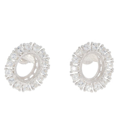 Sterling silver semi mount earrings setting with oval white topaz gemstones, designed for custom sizing.