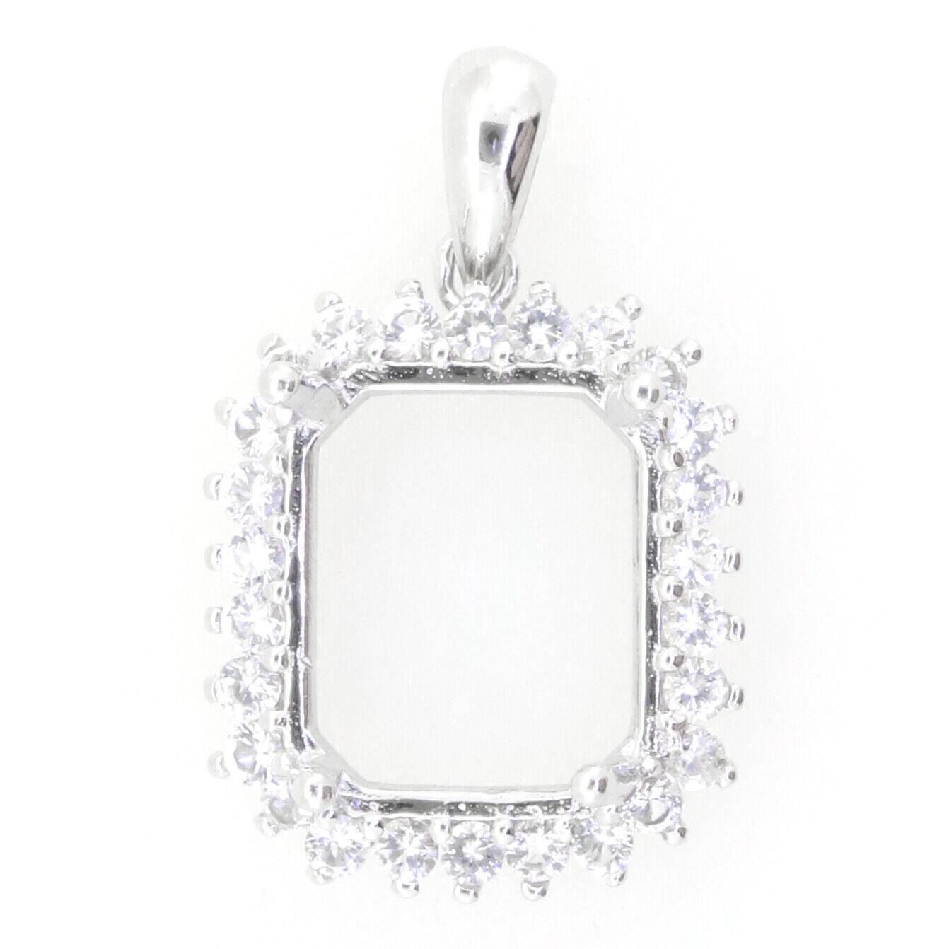Sterling silver semi mount pendant setting with an octagon shape for an emerald gemstone, featuring sparkling cubic zirconia.