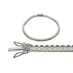 Custom sterling silver semi mount tennis bracelet setting with stainless steel tongue, showcasing intricate design.