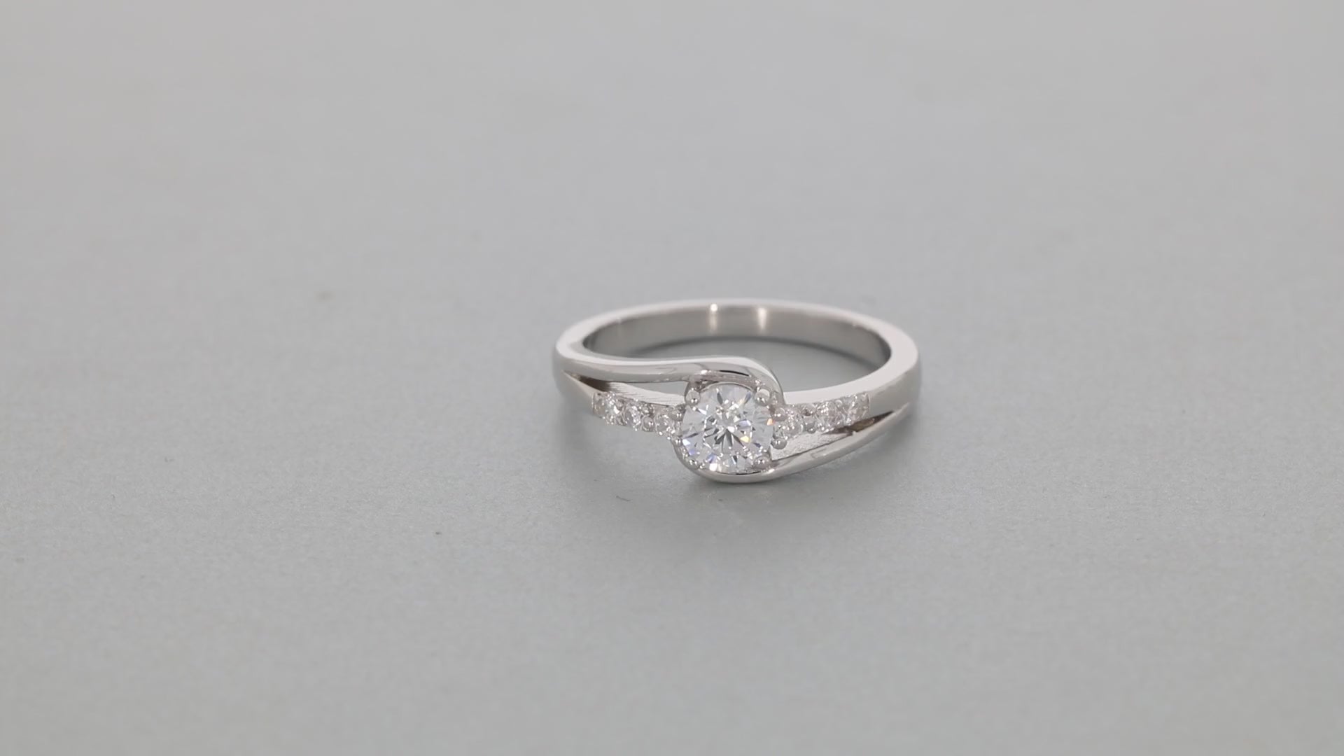 White Moissanite Sterling Silver Ring with Accent