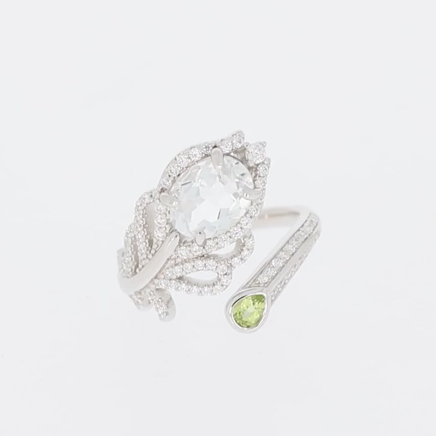 Oval Green Peridot Sterling Silver Ring with Moissanite Accent