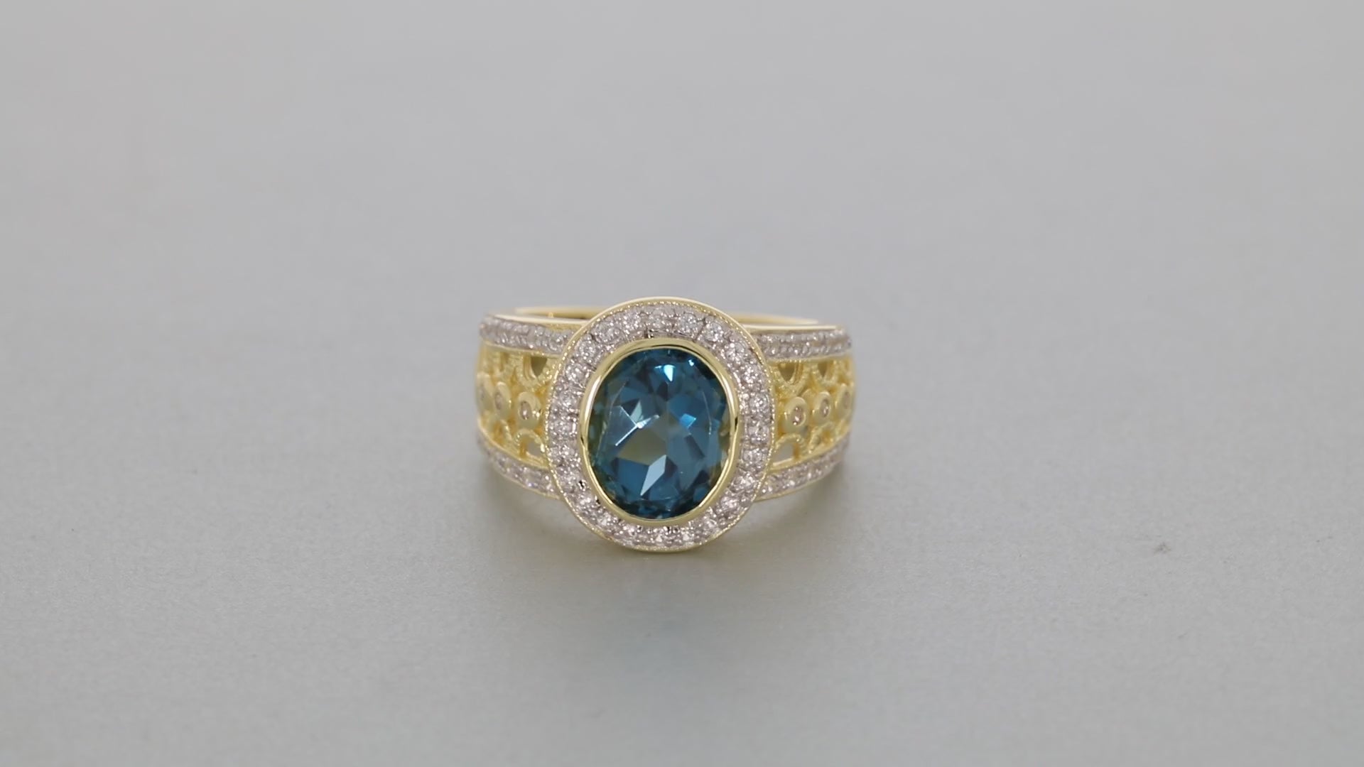 Oval Blue Topaz Sterling Silver Ring with Moissanite Accent