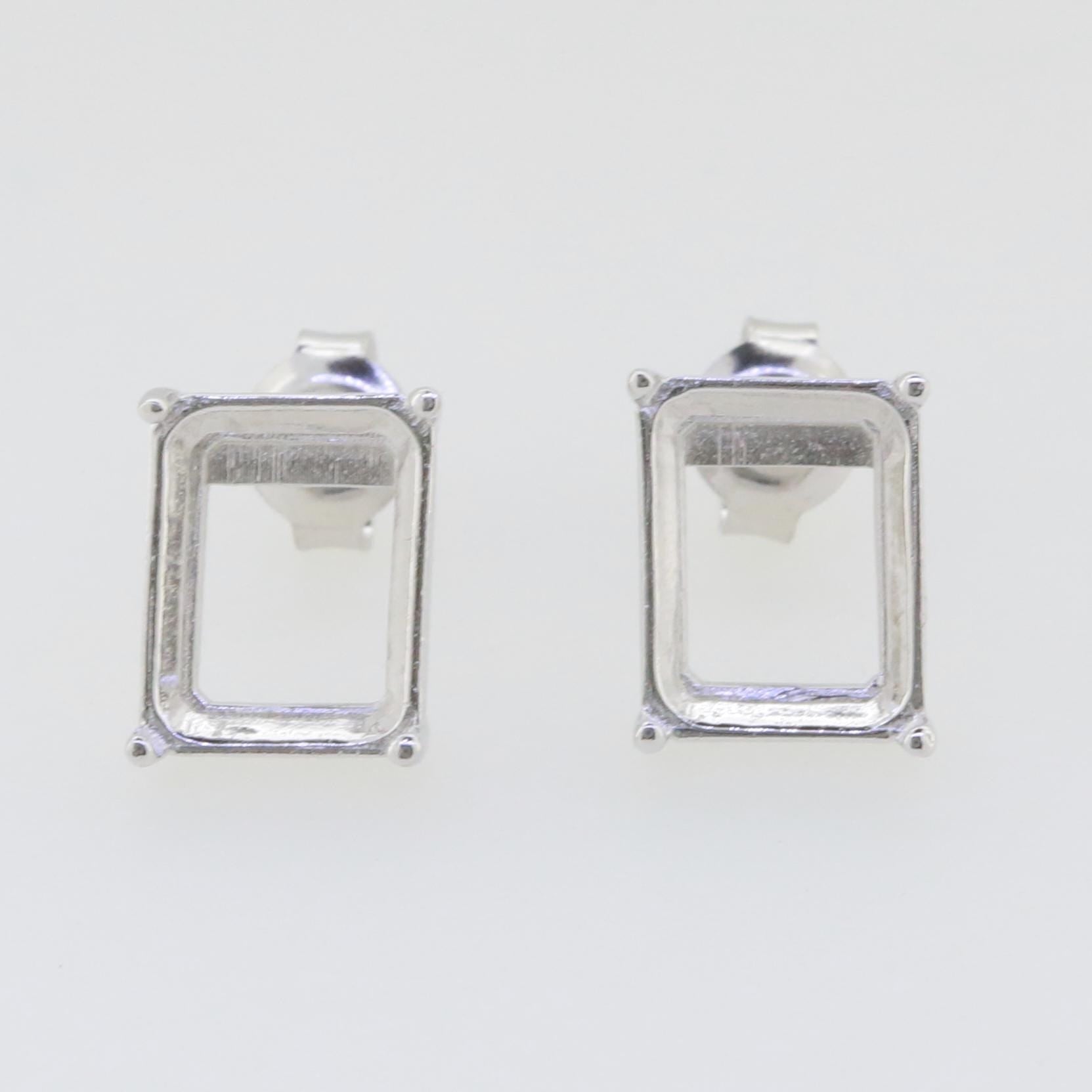 Sterling silver semi mount earring settings for Oct 10x8mm studs, ideal for custom gemstone installation.