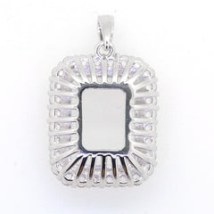 Sterling silver semi mount pendant setting with halo design for 16x12 emerald or gemstone, featuring white topaz accents.