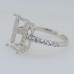 Sterling silver semi mount ring setting with white topaz accent, designed for a 14x10mm emerald gem.