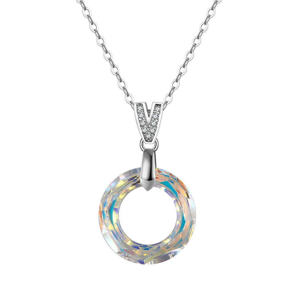 Sterling silver pendant necklace with round Austria crystal, symbolizing love and unity, adjustable 18 inch chain.