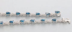 Trillion Blue London Topaz Sterling Silver Bracelet with Accent
