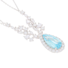Pear blue topaz sterling silver necklace with sparkling accents, elegant jewelry for sophisticated style.