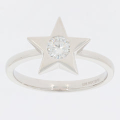 Star-shaped sterling silver ring featuring a round Moissanite gemstone, perfect for unique and elegant style.