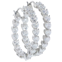 White Moissanite sterling silver earrings featuring sparkling gemstones in elegant hoop design.