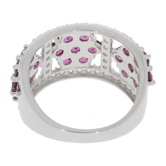 Back view of a round purple sapphire sterling silver ring featuring sparkling accents.