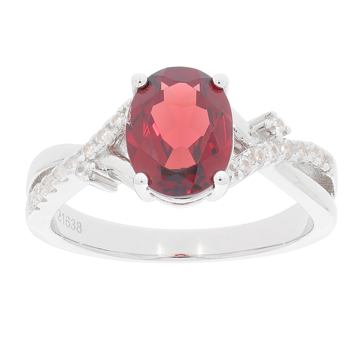 Elegant red garnet ring in sterling silver with diamond accents, perfect for a luxurious accessory collection.