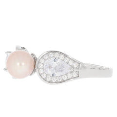 Elegant pink pearl sterling silver ring with sparkling gemstone accents.