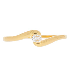 Elegant yellow gold ring with a sparkling diamond centerpiece and a unique twisted band design.