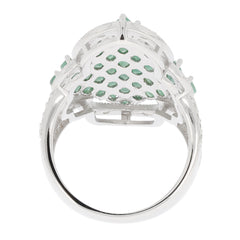 Back view of marquise green emerald sterling silver ring showcasing intricate design and sparkling gemstones.