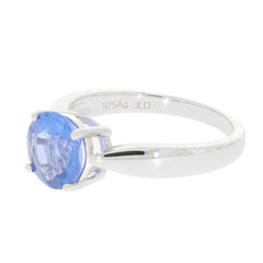 Round blue Tanzanite sterling silver ring showcasing a brilliant gemstone, perfect for elegant styles.