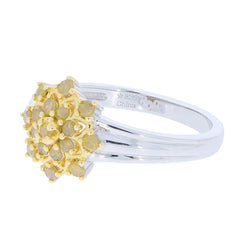 Yellow diamond sterling silver ring featuring a sparkling gemstone cluster, perfect for elegant fashion statements.
