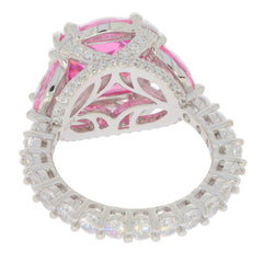 Round pink sapphire sterling silver ring showcasing sparkling accents and elegant design, perfect for a sophisticated collection.