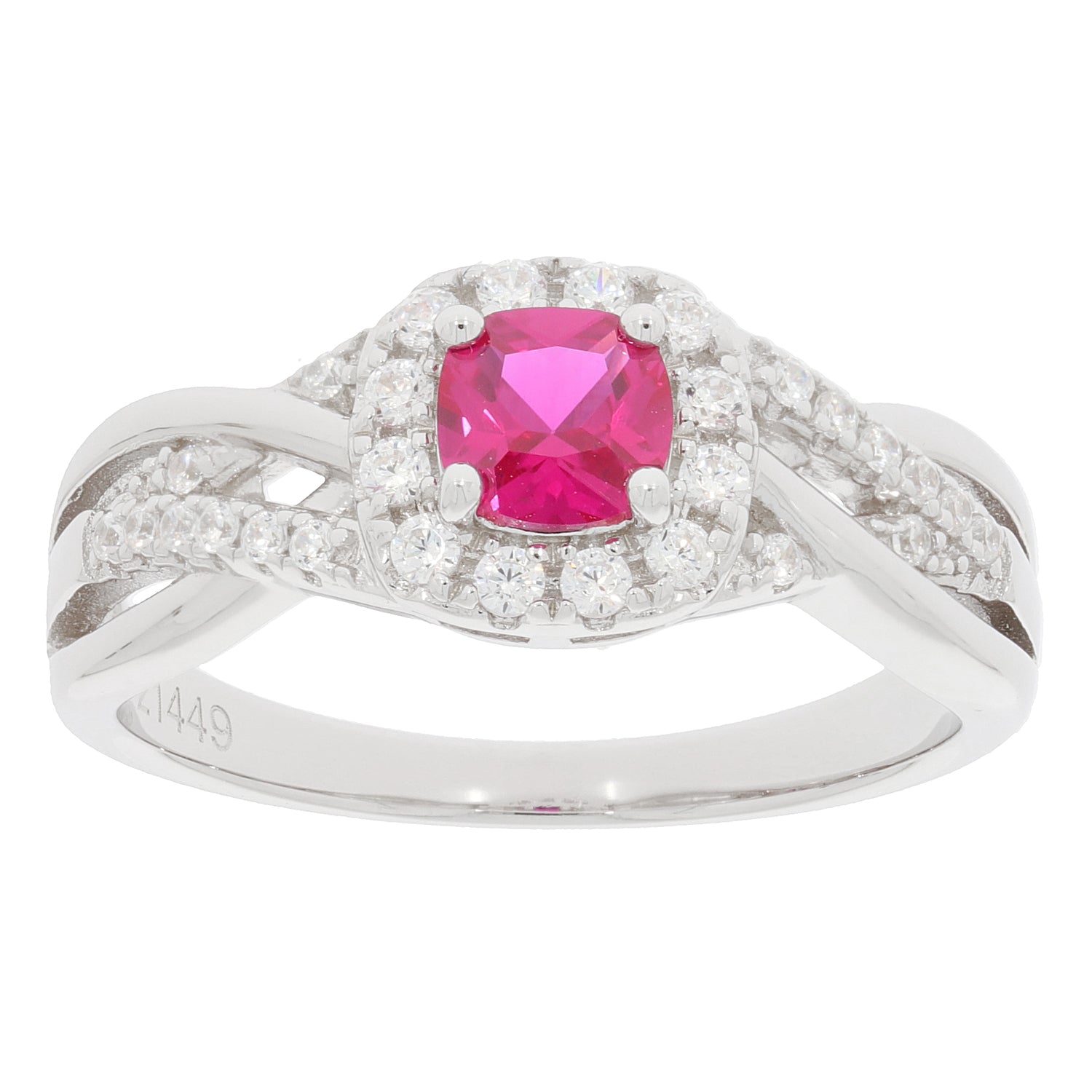 Pink sapphire sterling silver ring with diamond accent, featuring a sparkling gemstone in an elegant design.