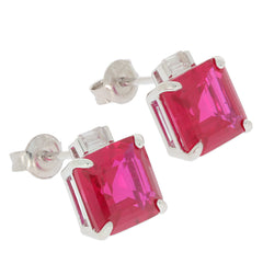Emerald red ruby sterling silver earrings featuring sparkling gemstone, perfect for elegant occasions.