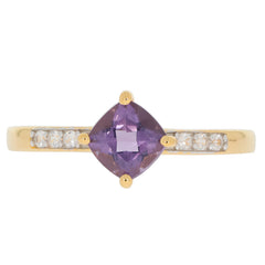 Cushion purple sapphire sterling silver ring with accent stones, showcasing luxury and elegance.