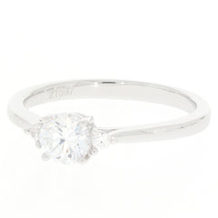 White Moissanite sterling silver ring with accent gemstones, showcasing elegant design and brilliance.
