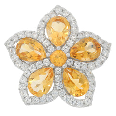 Exquisite flower-shaped ring featuring pear-cut yellow gemstones and sparkling accents in a luxurious design.