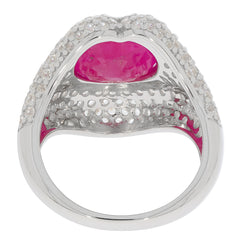 Oval red Moissanite sterling silver ring with accent stones, showcasing elegant design and vibrant gemstone.