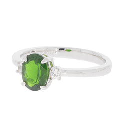 Oval green chrome diopside sterling silver ring with moissanite accents, elegant jewelry piece showcasing luxury.