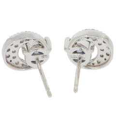 Elegant silver earrings featuring a unique cut-out design, perfect for adding a touch of sophistication to any outfit.