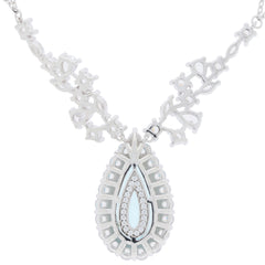 Pear blue topaz sterling silver necklace with accent in elegant floral design, perfect for adding sophistication to any outfit.
