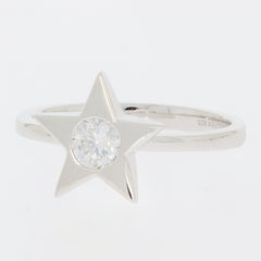 Star-shaped sterling silver ring featuring a round sparkling Moissanite gemstone center.