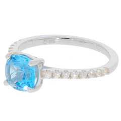 Cushion cut blue gemstone sterling silver ring with sparkling accent stones, elegant and sophisticated design.