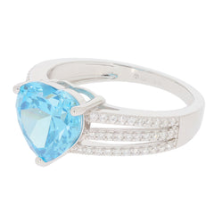 Heart blue topaz sterling silver ring with accent stones, elegant and sparkling, perfect for sophisticated jewelry collections.