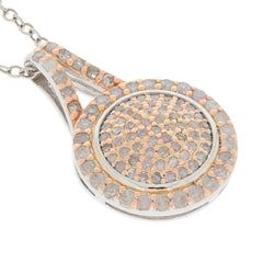 Elegant sterling silver pendant with a round, sparkling gemstone design featuring white diamonds and a luxurious finish.