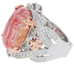 Oval red coral sterling silver ring with sparkling accents, elegantly designed for a sophisticated look.
