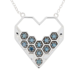 Blue diamond sterling silver heart necklace with sparkling gemstones, perfect for elegant style and luxury.