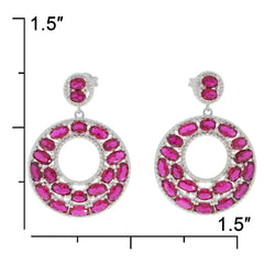 Oval pink sapphire sterling silver earrings with accent, measuring 1.5 inches, showcasing elegant design and brilliance.
