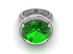 Green emerald sterling silver ring with accent stones, showcasing a brilliant gemstone centerpiece.