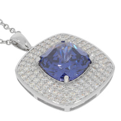 Elegant blue sapphire sterling silver pendant with sparkling accents, perfect for adding luxury to any outfit.