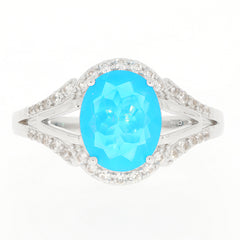 Blue Opal sterling silver ring with sparkling accents, showcasing an elegant oval design and luxurious gemstone.