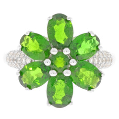 Oval green Chrome Diopside ring in sterling silver, featuring a flower design with sparkling green gemstones.