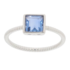 Princess blue sapphire sterling silver ring with a sparkling gemstone, perfect for elegant occasions.