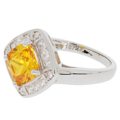 Elegant yellow gemstone ring with sparkling accents in silver, perfect for any occasion.