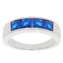 Blue Sapphire Sterling Silver Ring featuring four sparkling blue gemstones, perfect for elegant occasions.