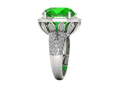 Elegant green emerald sterling silver ring with leaf design and sparkling accent stones.